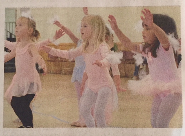 Students practicing Ballet positions in Pre-Ballet and Character class